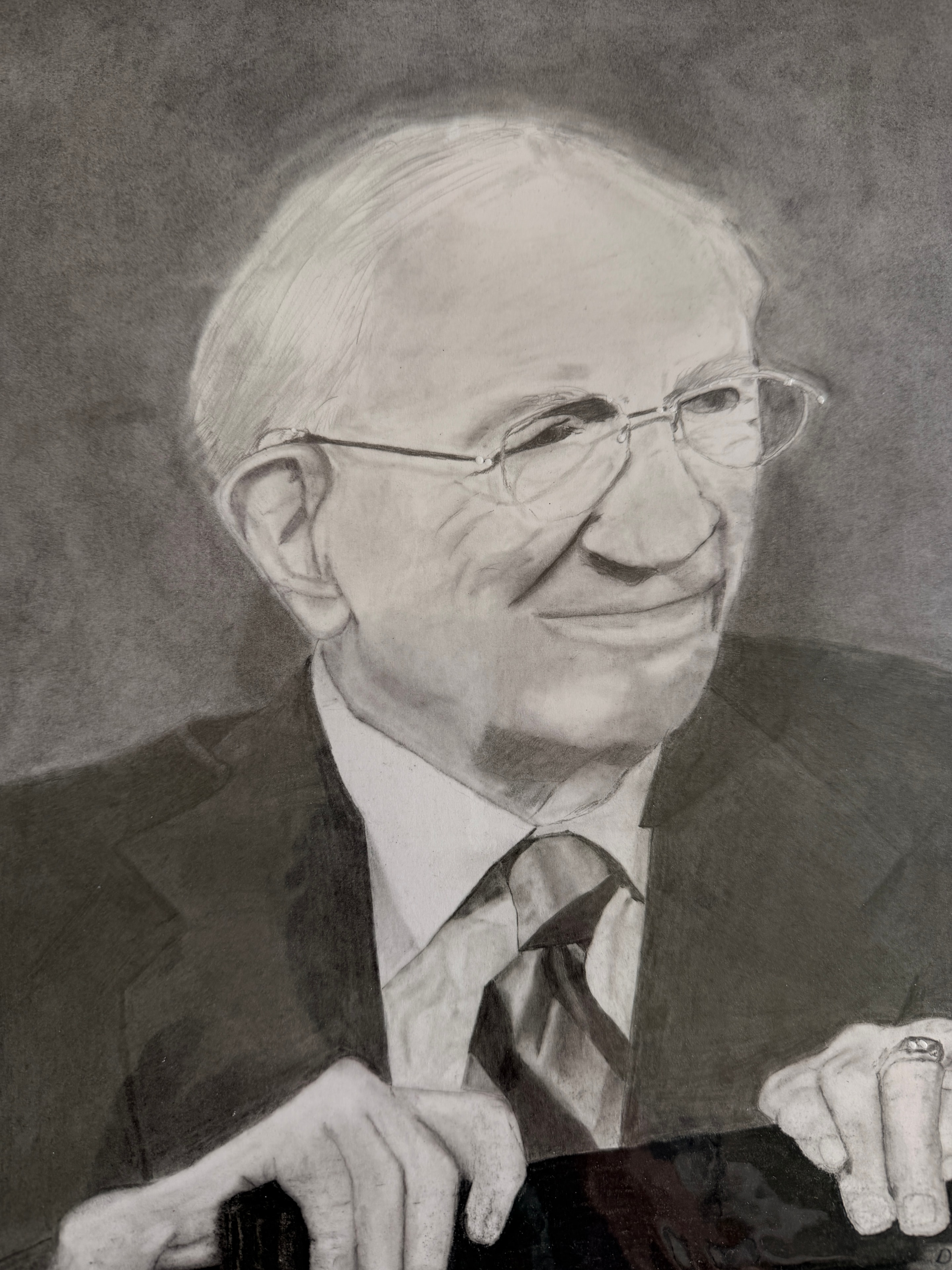 Monochrome pencil drawing of a person holding a camera